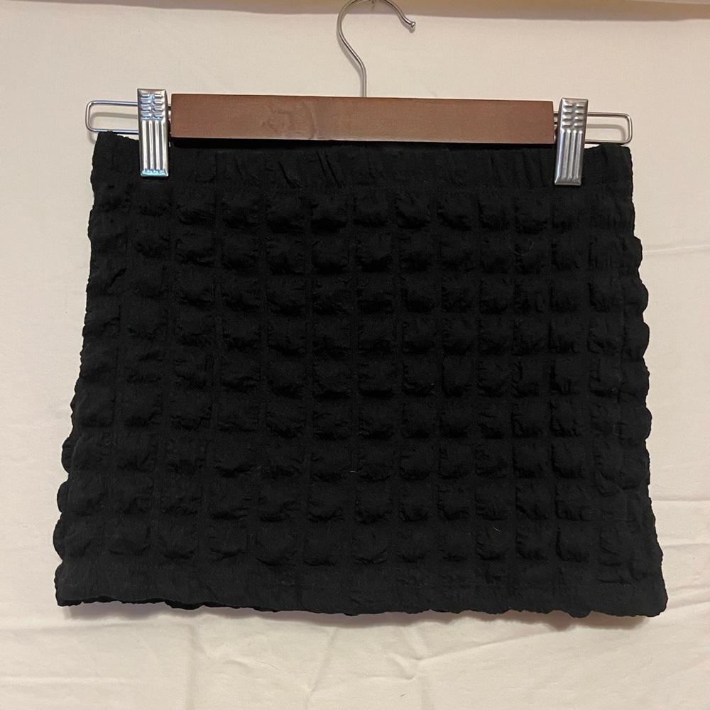 Black mini skirt